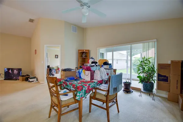 a kitchen filled with a white cabinets and appliances