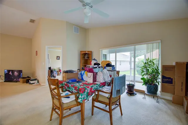 a kitchen filled with a white cabinets and appliances