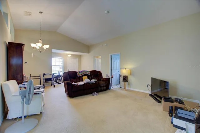 a room with furniture and a large window