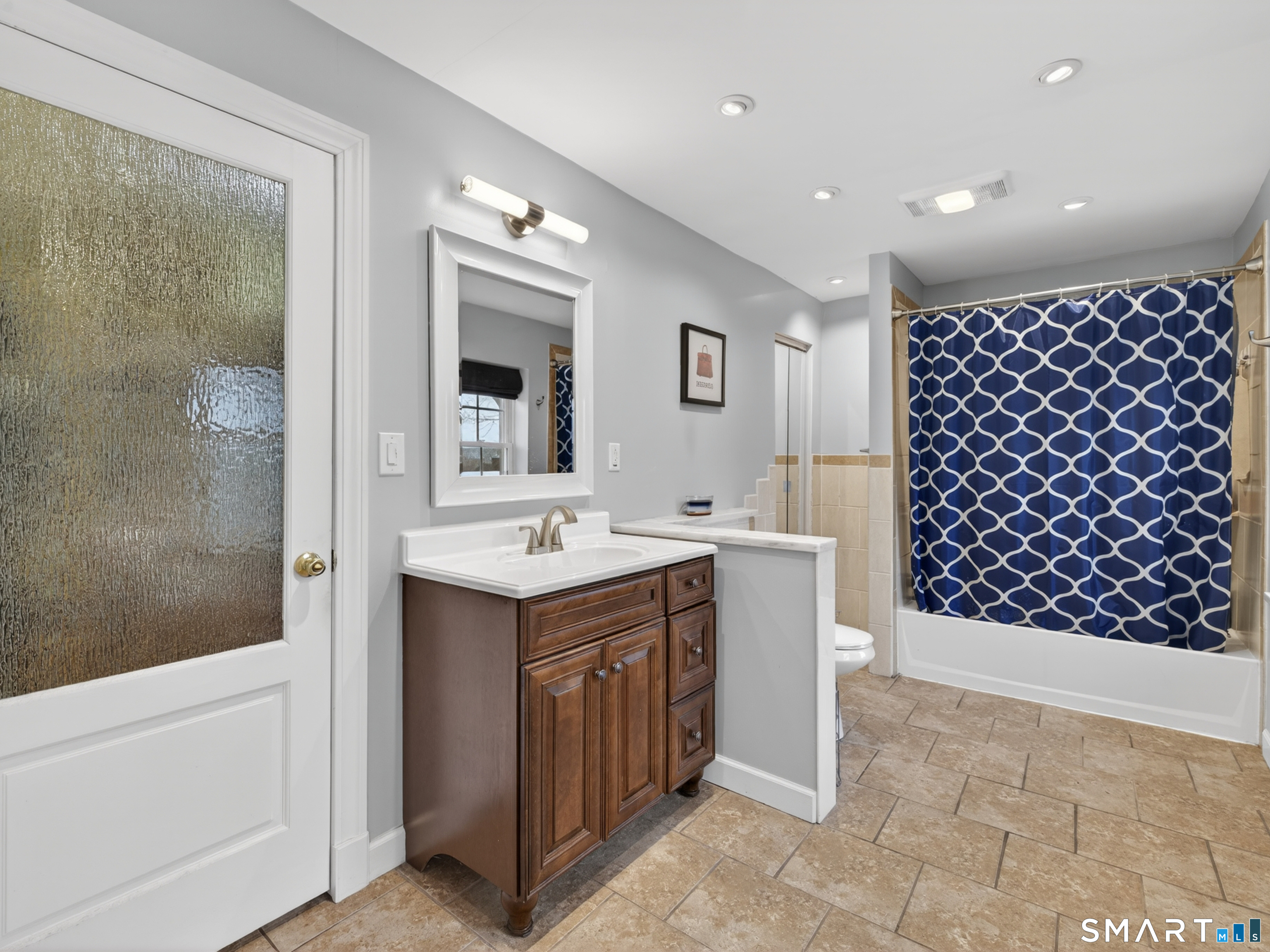 76 Starr Hill Road Groton, CT 06340 - Photo 20 of 40 a bathroom with a double vanity sink mirror and shower