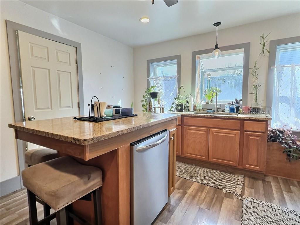 23 Main Street Taylorstown, PA 15365 - Photo 12 of 22 a kitchen with a sink cabinets and wooden floor
