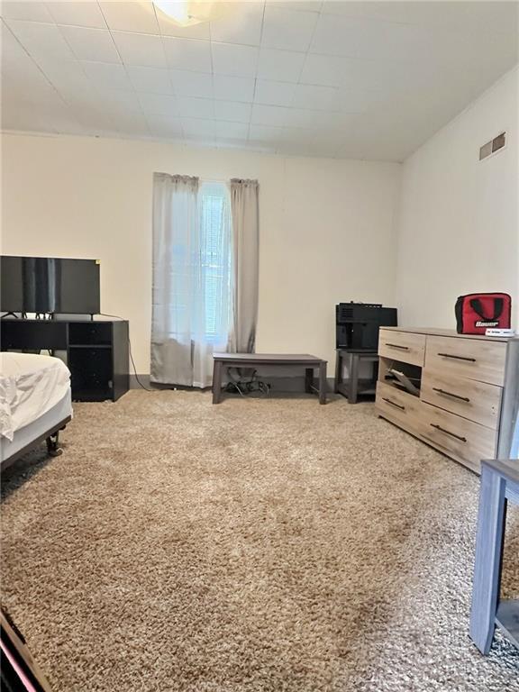 23 Main Street Taylorstown, PA 15365 - Photo 16 of 22 a bed room with furniture and a flat screen tv