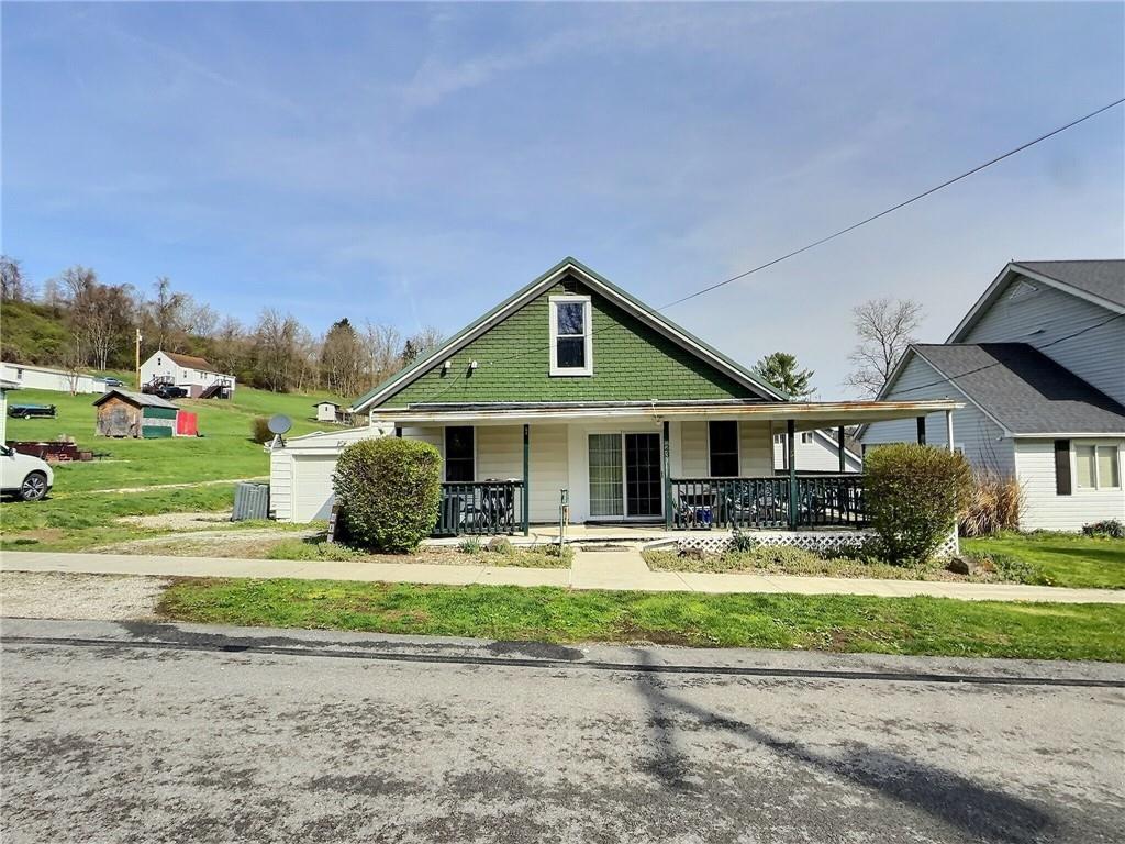 23 Main Street Taylorstown, PA 15365 - Photo 3 of 22 a front view of house with yard and green space