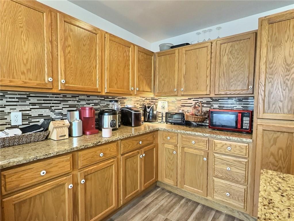 23 Main Street Taylorstown, PA 15365 - Photo 8 of 22 a kitchen with stainless steel appliances granite countertop a sink a stove and cabinets