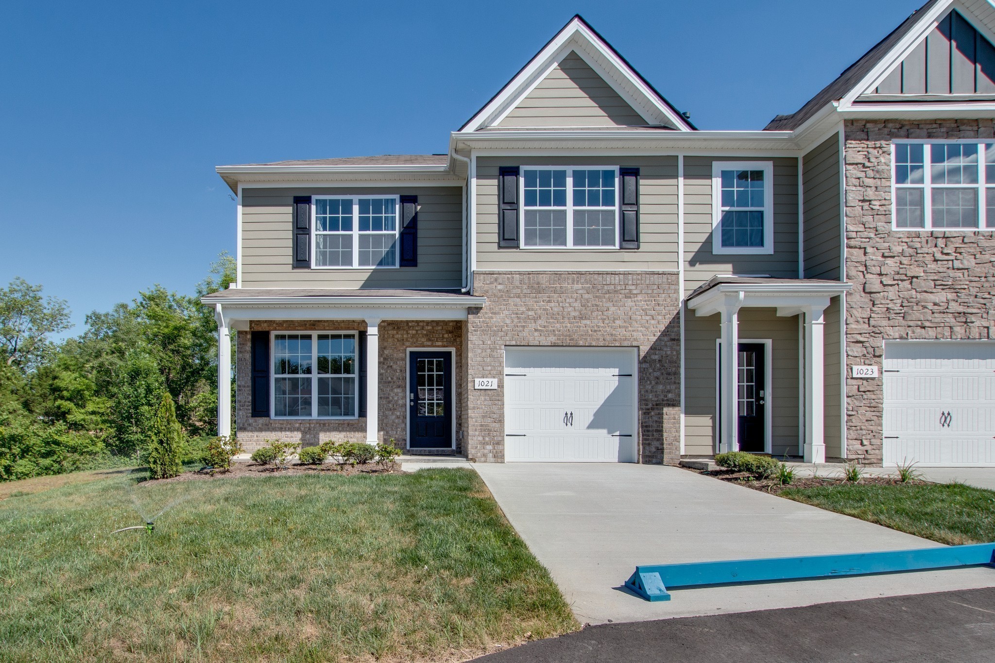 411 Waterfowl Way, Unit 119 Lebanon, TN 37090 - Photo 1 of 32 front view of a house with a yard