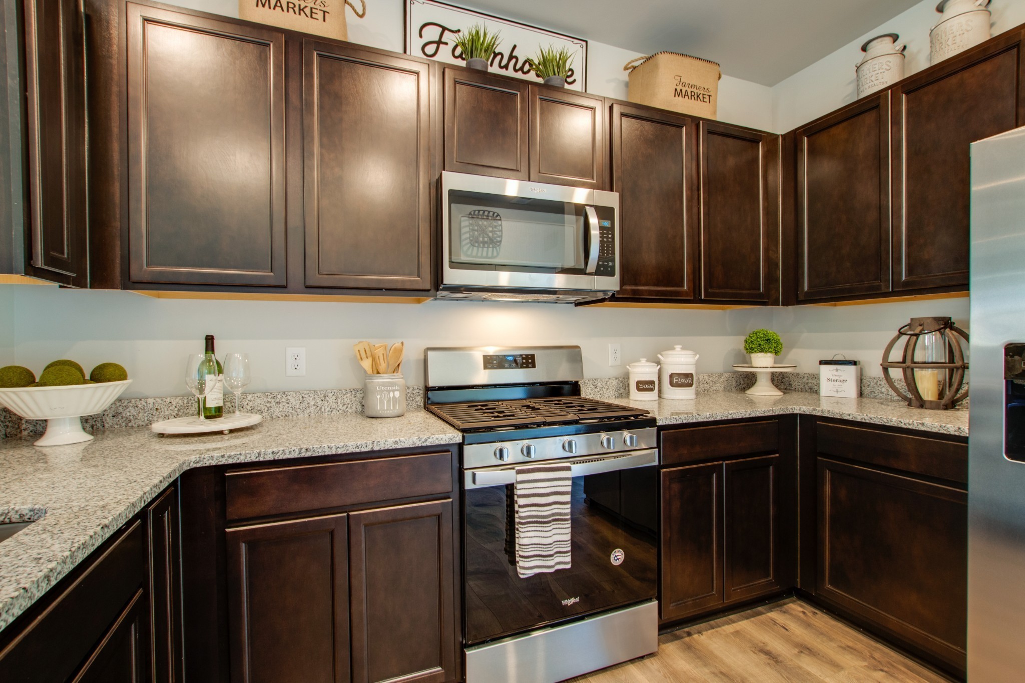 411 Waterfowl Way, Unit 119 Lebanon, TN 37090 - Photo 15 of 32 a kitchen with granite countertop stainless steel appliances and cabinets