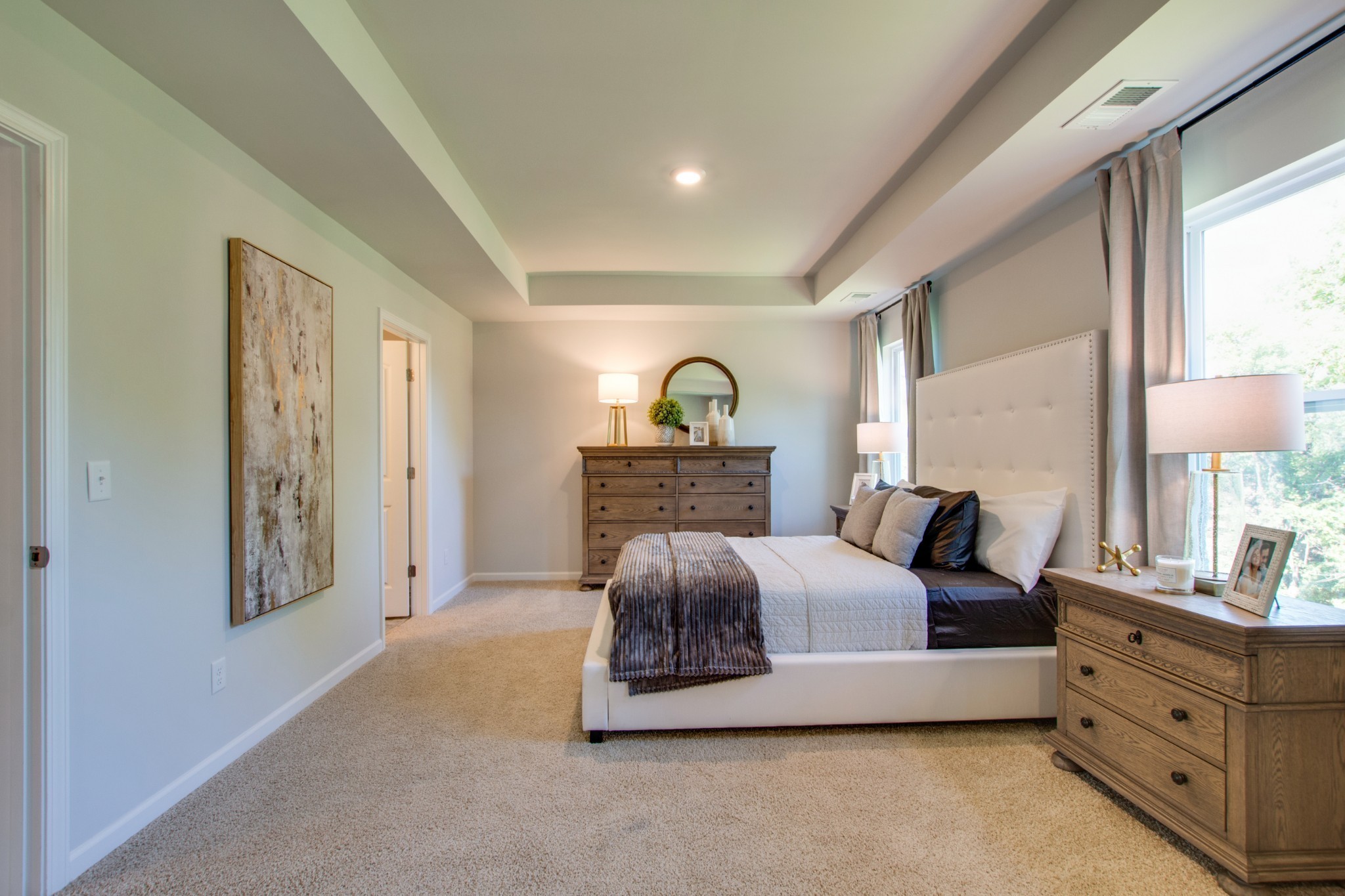 411 Waterfowl Way, Unit 119 Lebanon, TN 37090 - Photo 22 of 32 a living room with furniture and a lamp