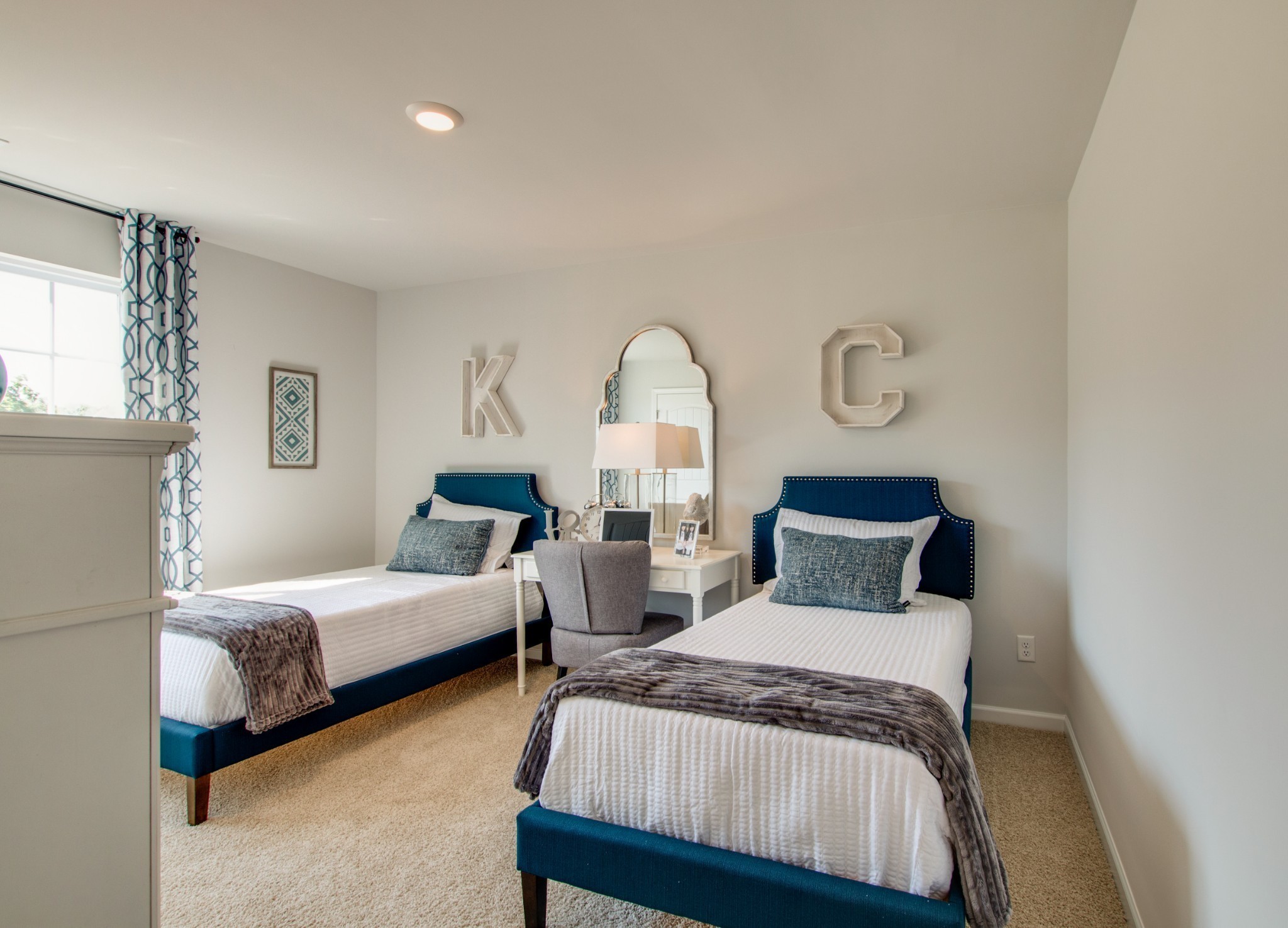 411 Waterfowl Way, Unit 119 Lebanon, TN 37090 - Photo 31 of 32 a bedroom with two beds and a window