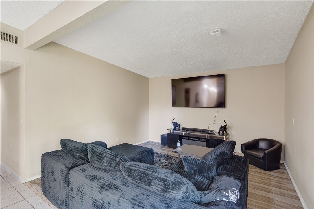 422 Del Monte Road Sebastian, FL 32958 - Photo 10 of 35 a living room with furniture and a flat screen tv