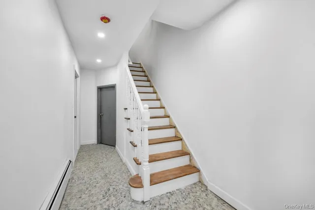 a view of an entryway with stairs