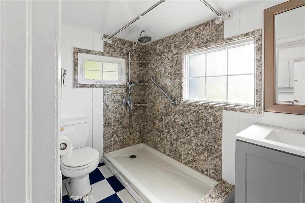 818 6th Street Corning, CA 96021 - Photo 19 of 32 a bathroom with a sink toilet and shower