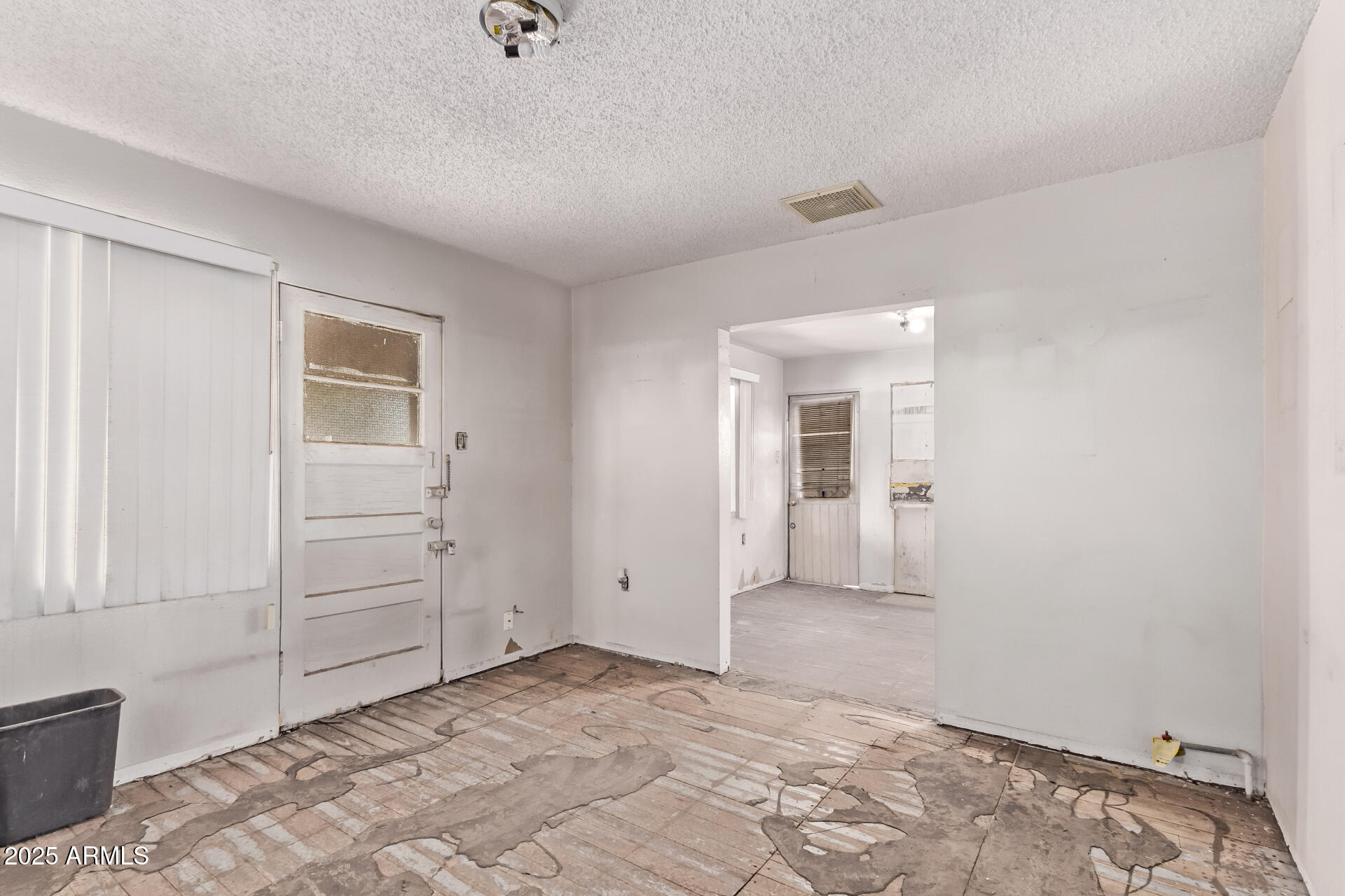 1017 East Taylor Street Phoenix, AZ 85006 - Photo 12 of 45 wooden floor in an empty room