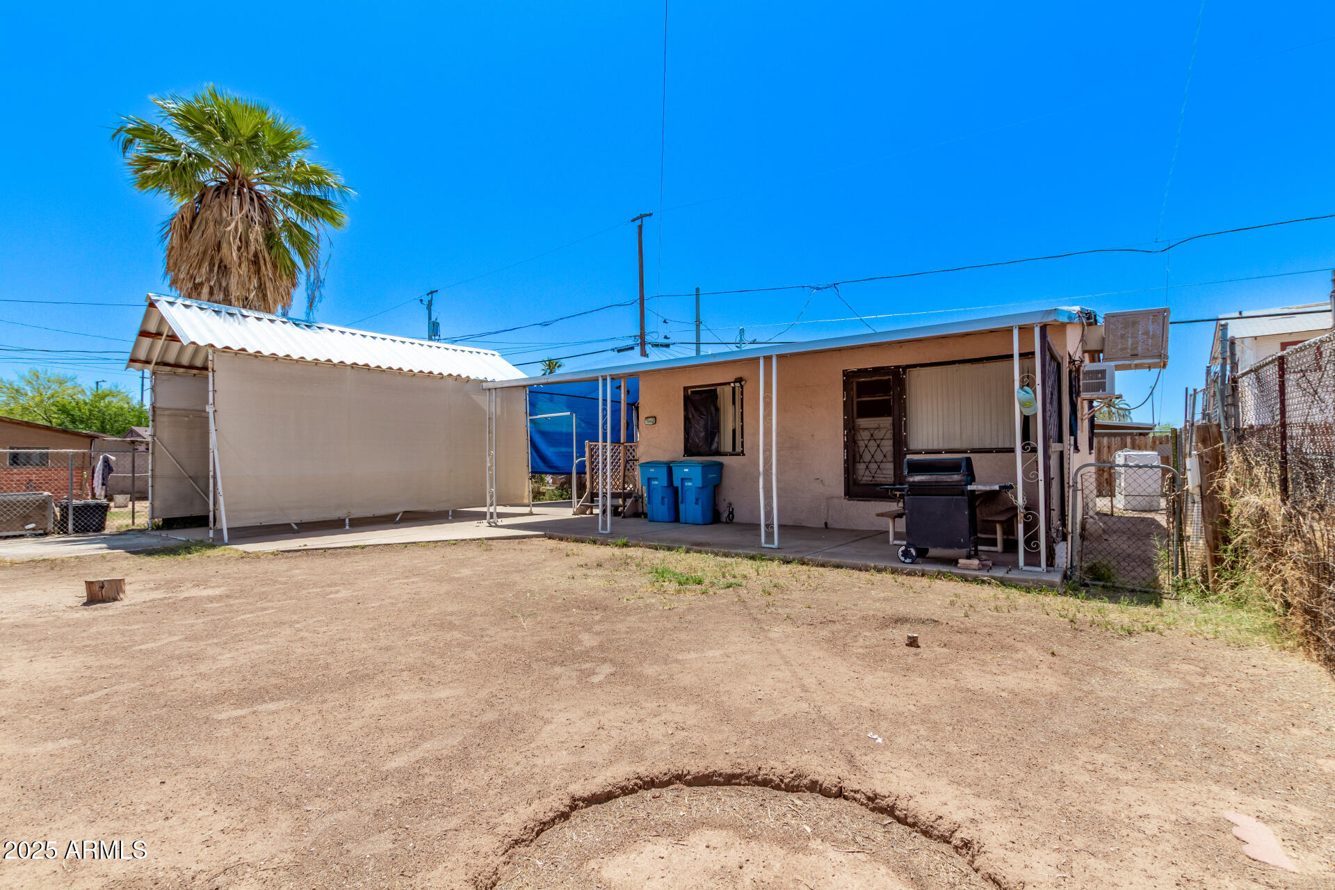 1017 East Taylor Street Phoenix, AZ 85006 - Photo 33 of 45 a view of a house with backyard and sitting area