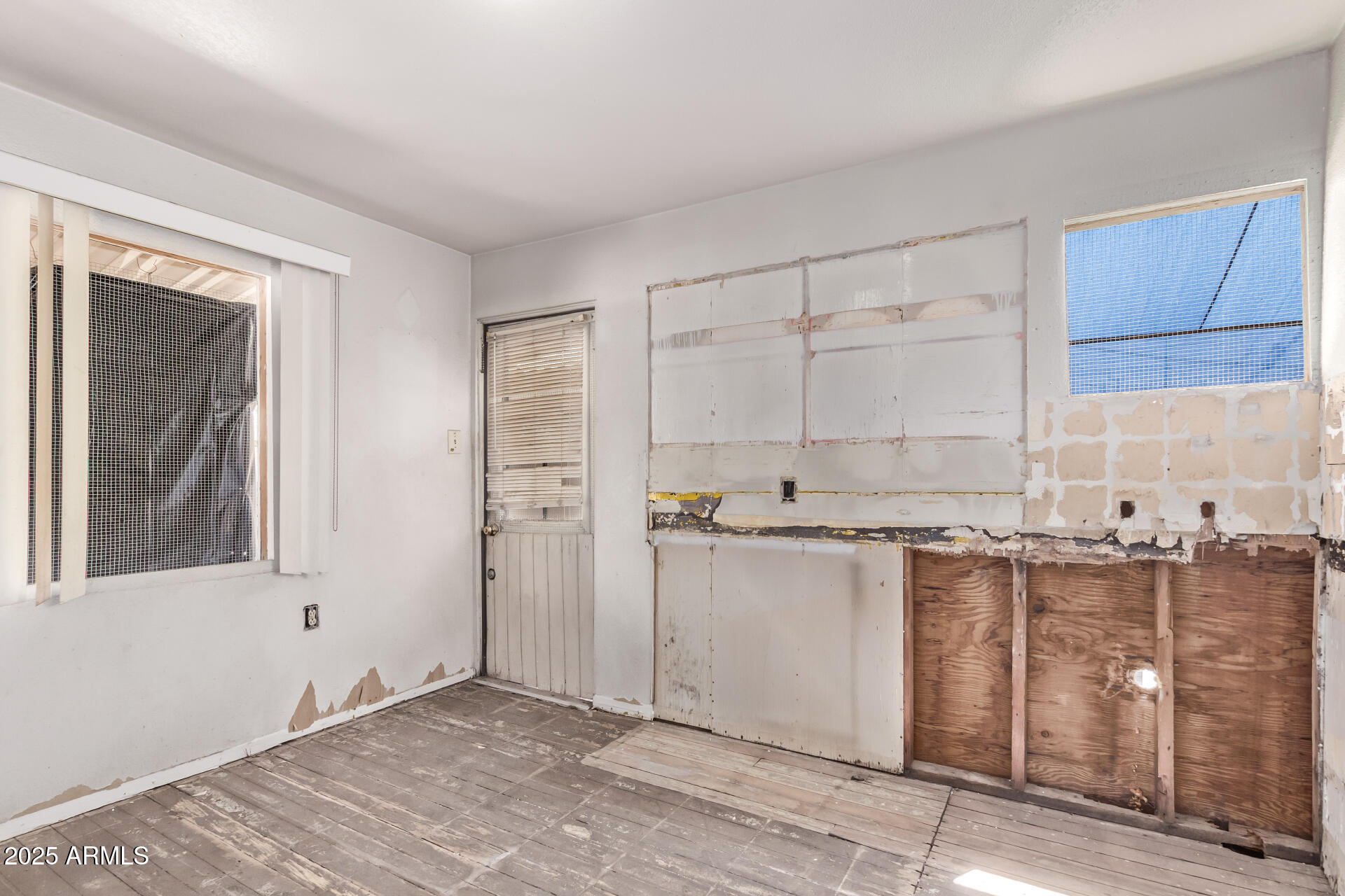 1017 East Taylor Street Phoenix, AZ 85006 - Photo 10 of 45 a kitchen with stainless steel appliances granite countertop a refrigerator and a stove top oven