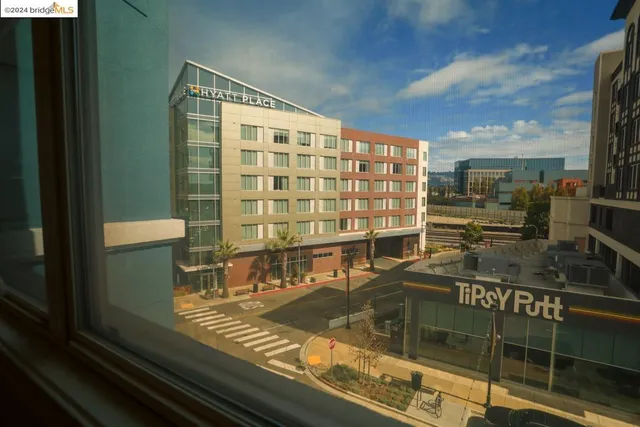 a view of a balcony with chairs