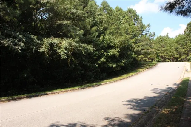 a view of house with yard