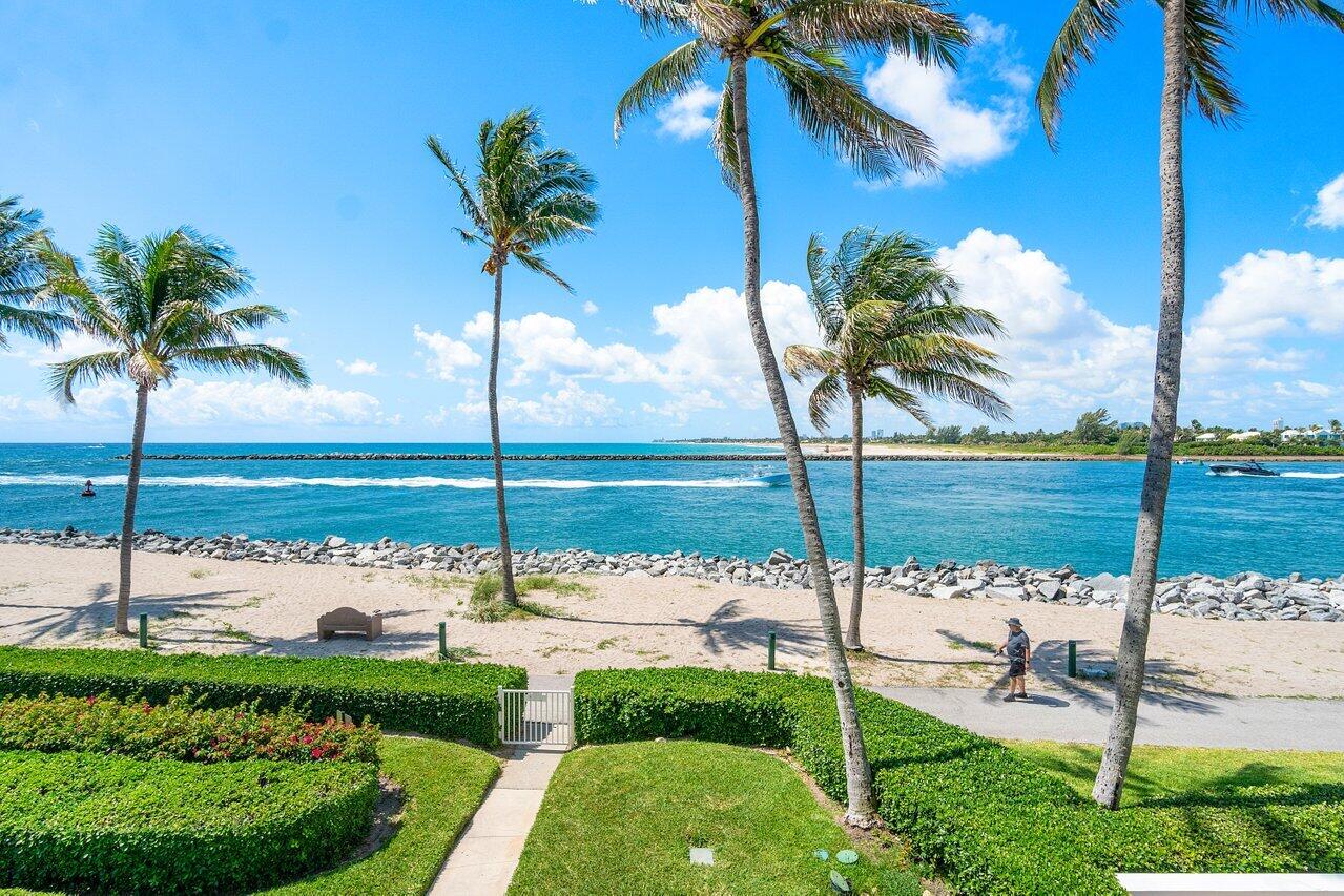 120 Inlet Way, Unit 204 Palm Beach Shores, FL 33404 - Photo 26 of 27 a view of a garden and an ocean view