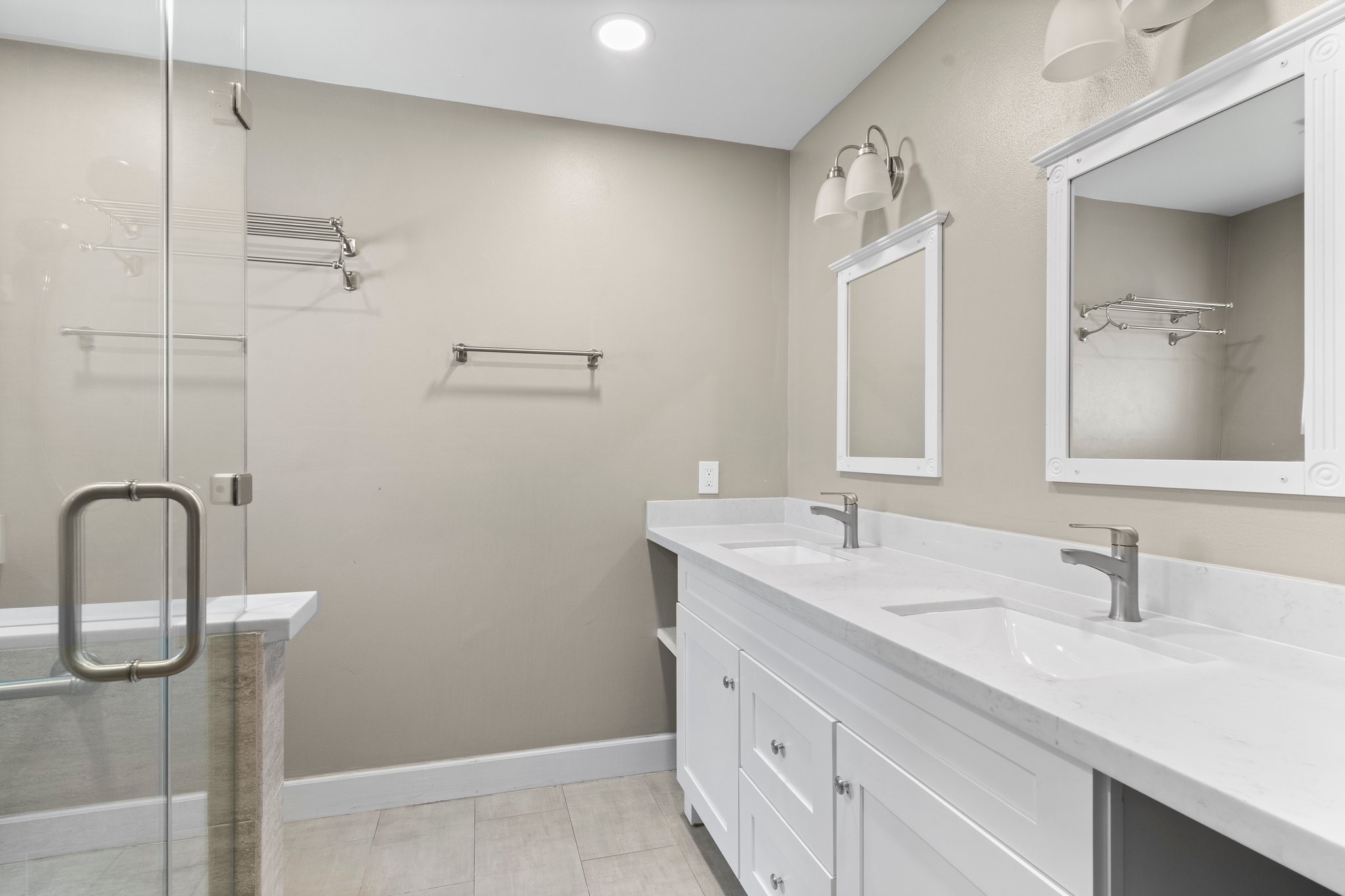 27234 Wells Lane Conroe, TX 77385 - Photo 11 of 15 a bathroom with a sink and a mirror