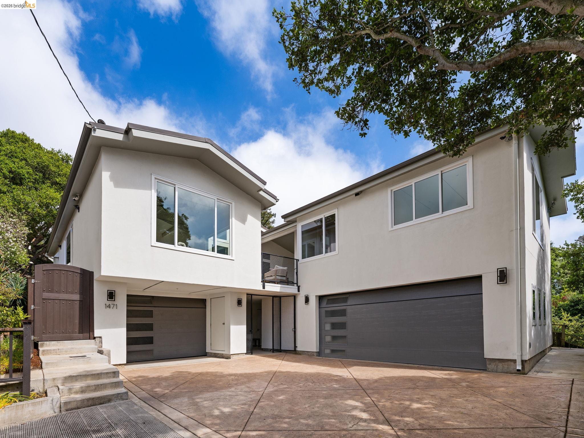 1471 Scenic Avenue Berkeley, CA 94708 - Photo 1 of 42 a house with a tree in front of it