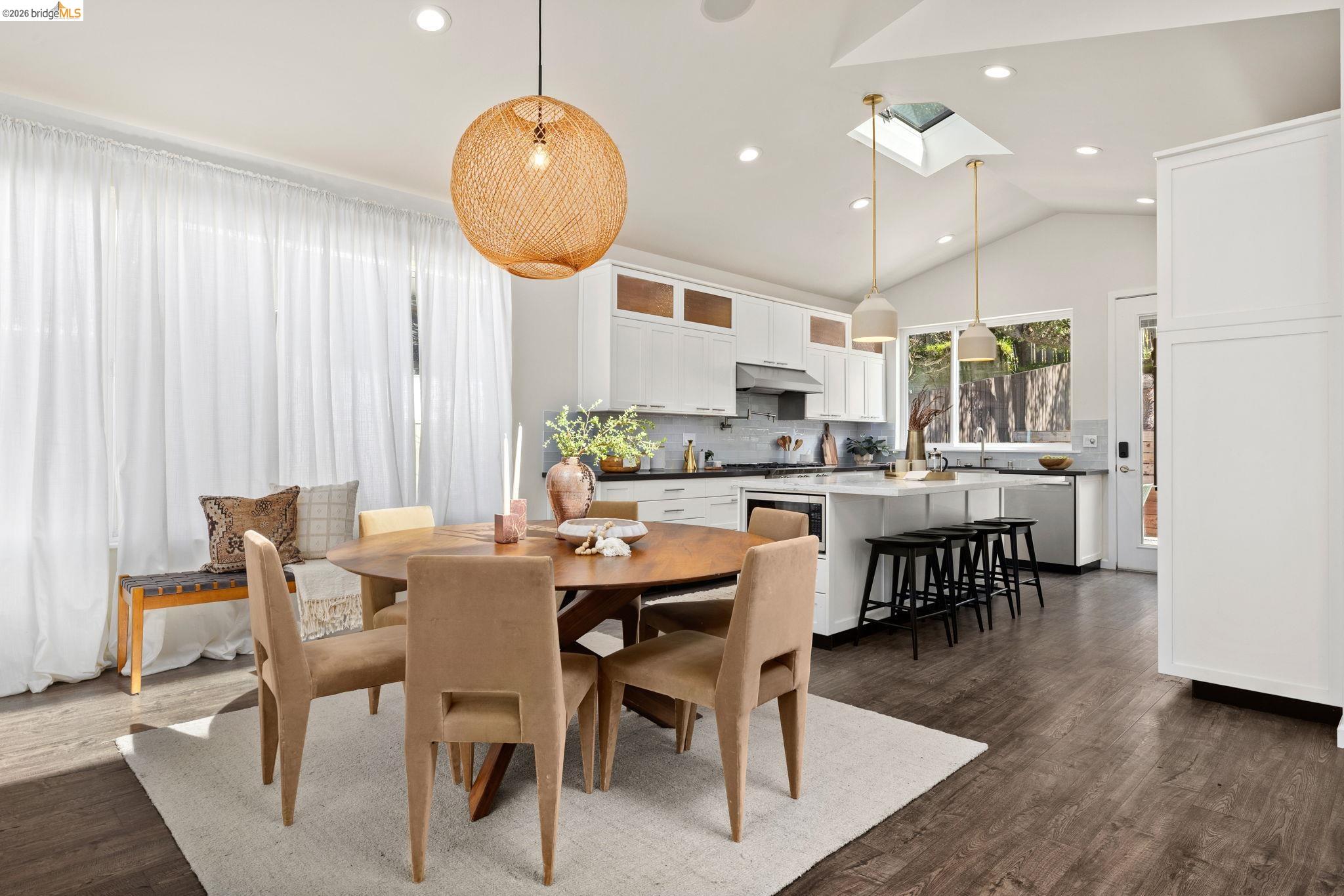 1471 Scenic Avenue Berkeley, CA 94708 - Photo 11 of 42 a view of a dining room with furniture and wooden floor