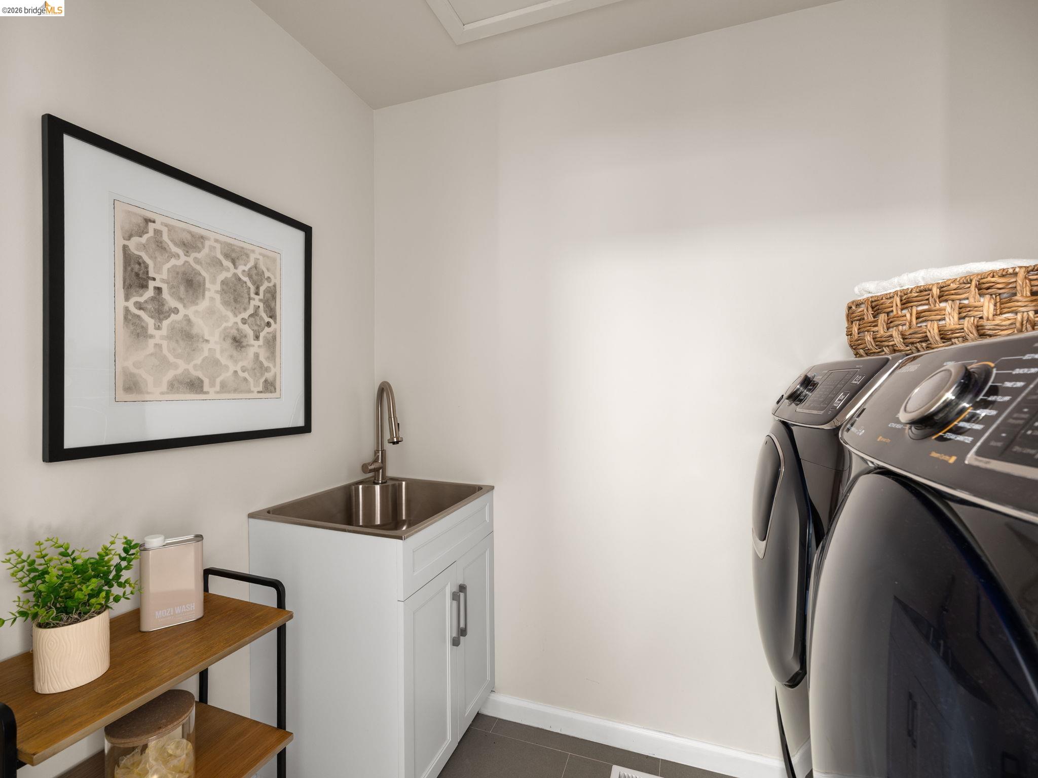 1471 Scenic Avenue Berkeley, CA 94708 - Photo 17 of 42 a view of a utility room with a sink
