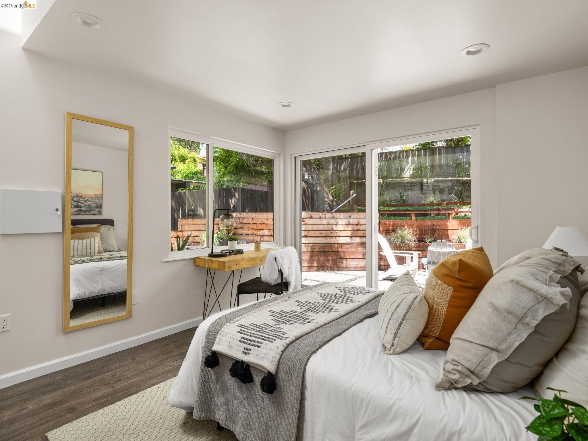 1471 Scenic Avenue Berkeley, CA 94708 - Photo 20 of 42 a bedroom with a bed and a large window