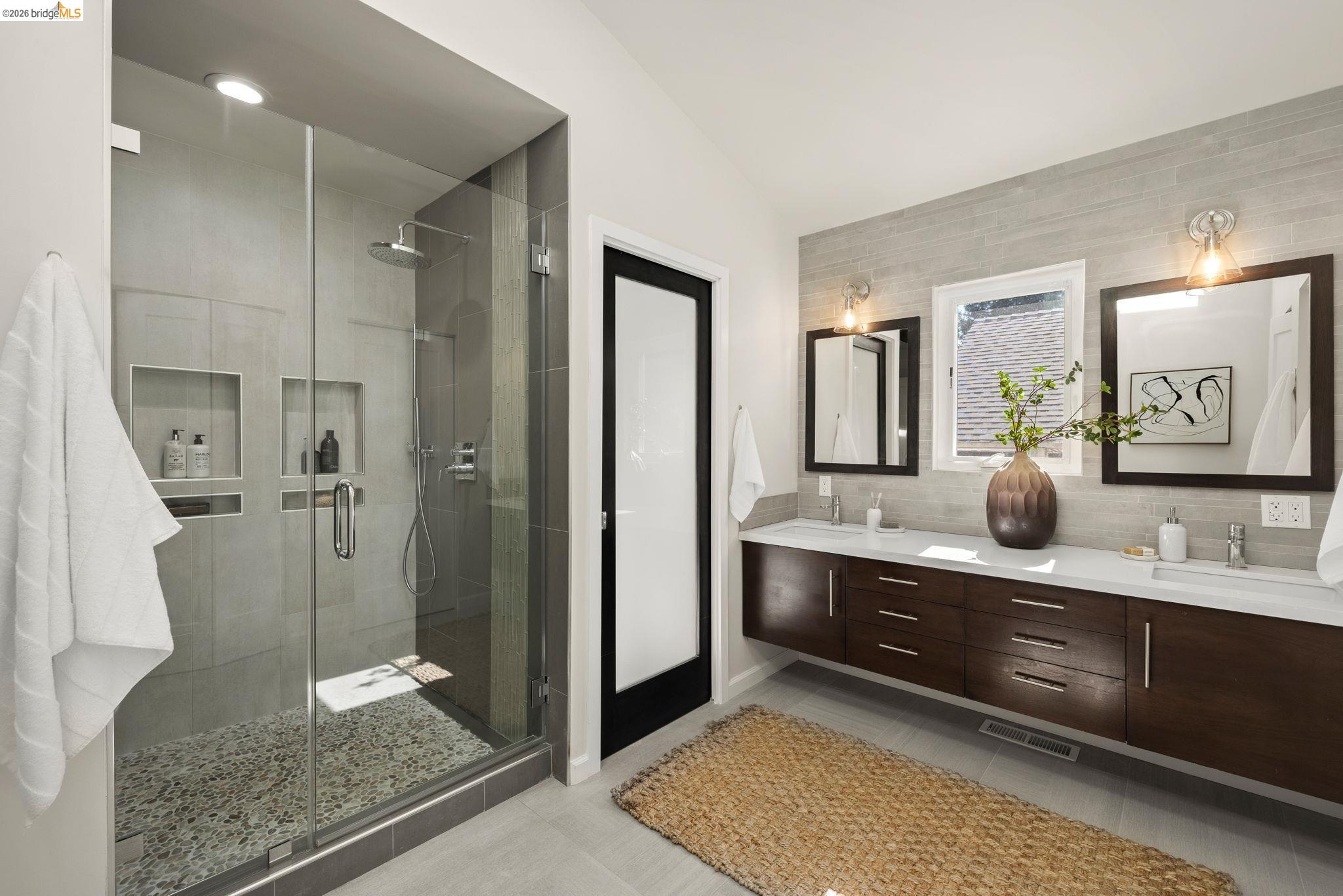 1471 Scenic Avenue Berkeley, CA 94708 - Photo 26 of 42 a bathroom with a granite countertop sink mirror and shower