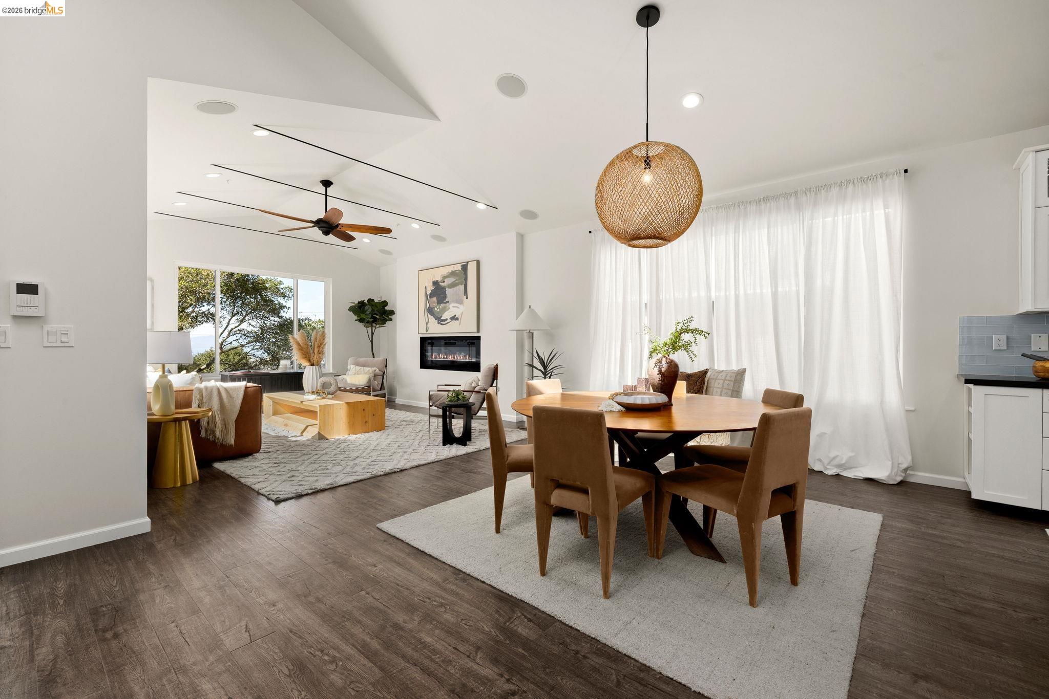 1471 Scenic Avenue Berkeley, CA 94708 - Photo 3 of 42 a view of a dining room with furniture wooden floor and chandelier