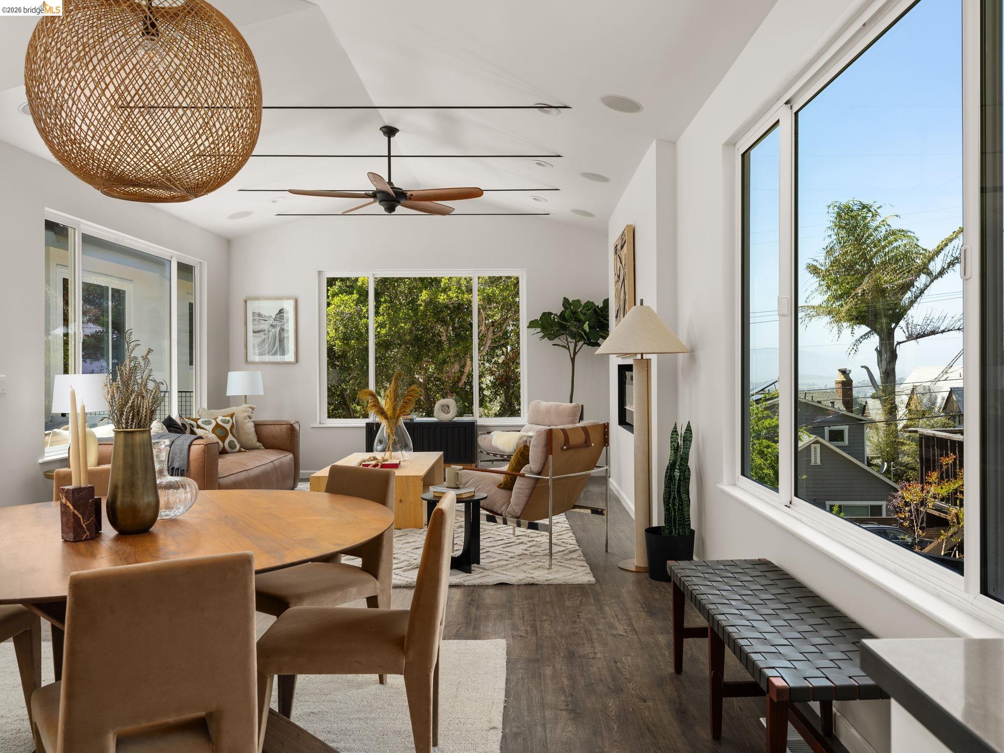 1471 Scenic Avenue Berkeley, CA 94708 - Photo 4 of 42 a dining room with furniture a chandelier and wooden floor