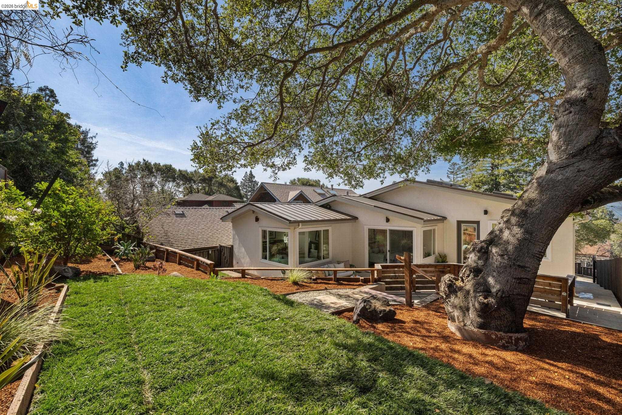 1471 Scenic Avenue Berkeley, CA 94708 - Photo 41 of 42 a front view of a house with garden