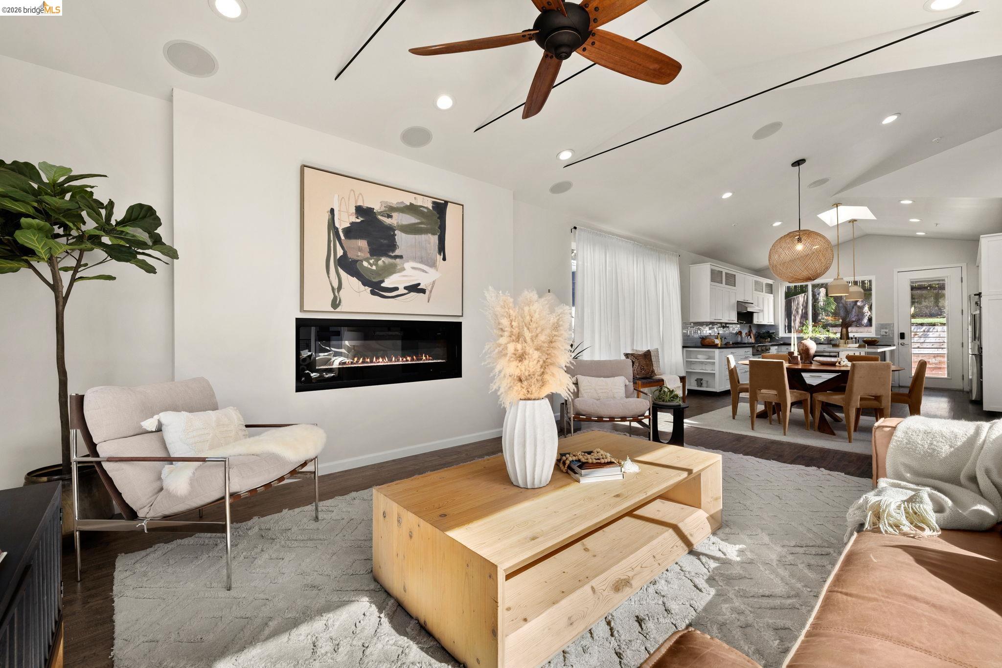 1471 Scenic Avenue Berkeley, CA 94708 - Photo 7 of 42 a living room with furniture and a potted plant