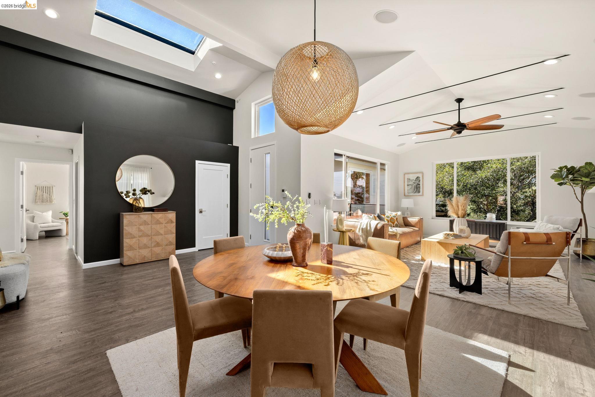 1471 Scenic Avenue Berkeley, CA 94708 - Photo 9 of 42 a view of a dining room with furniture window and wooden floor