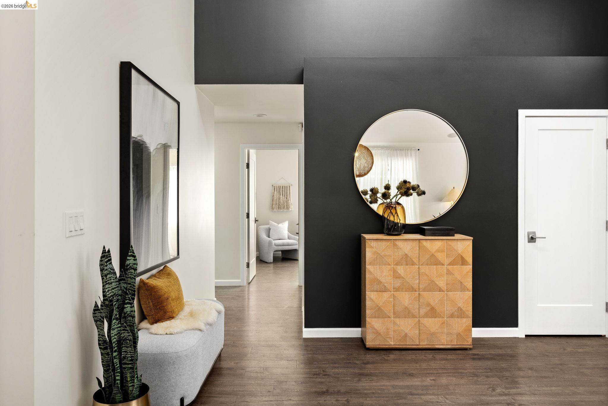 1471 Scenic Avenue Berkeley, CA 94708 - Photo 10 of 42 a living room with furniture and a mirror