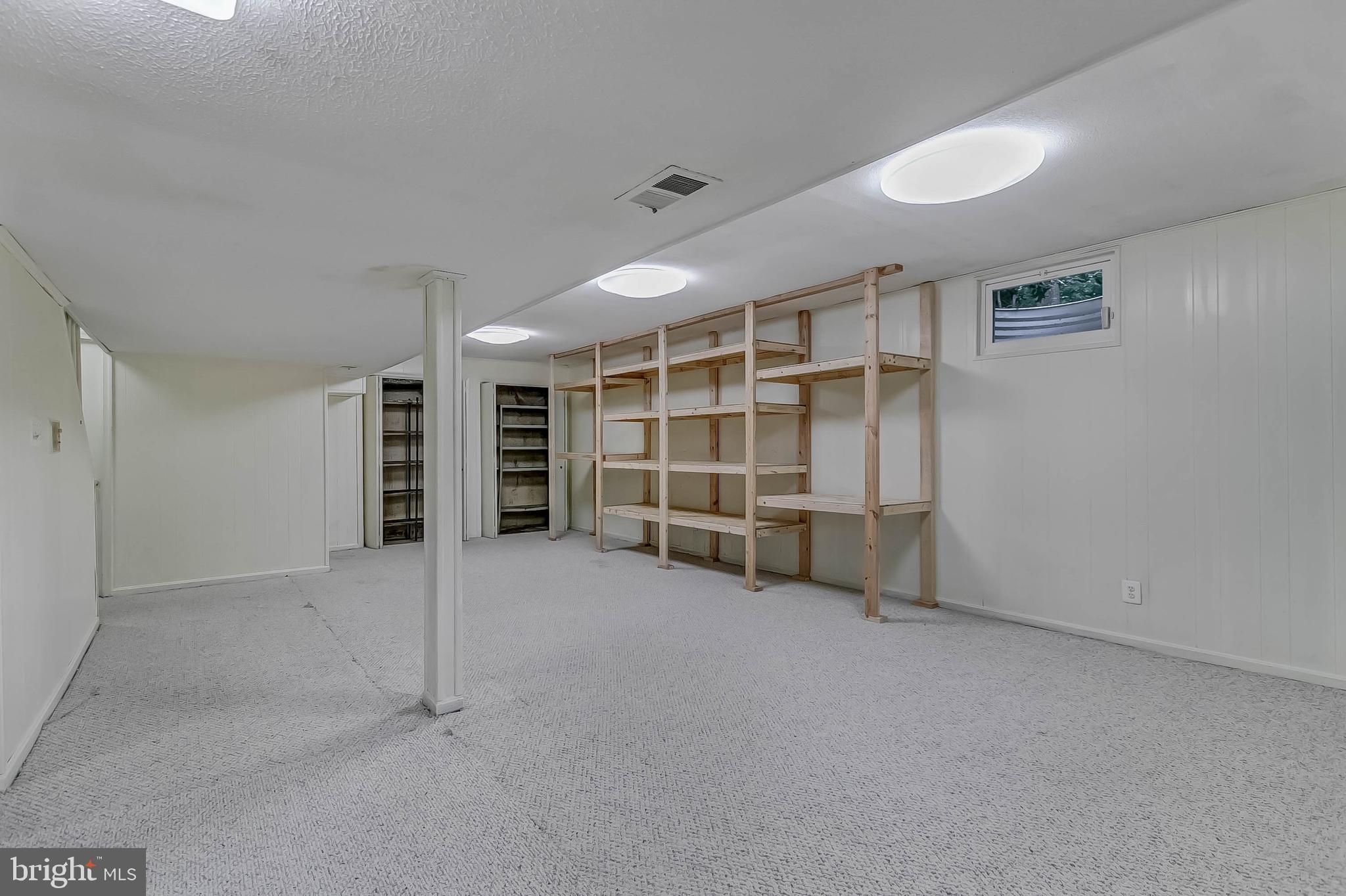 2908 Bluff Point Lane Silver Spring, MD 20906 - Photo 57 of 63 Extra storage shelving in basement