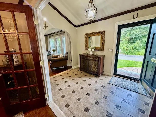 a living room with a large bed and a large window