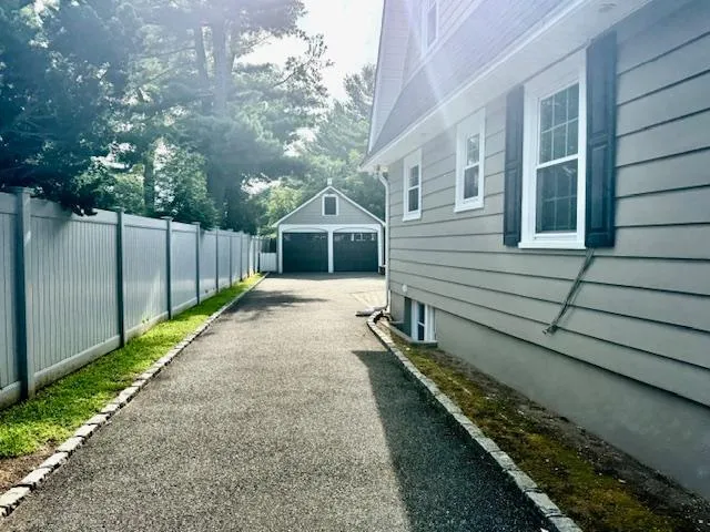 a house with trees in front of it