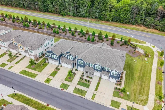 a view of a balcony with wooden floor