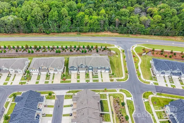 a view of swimming pool with seating area