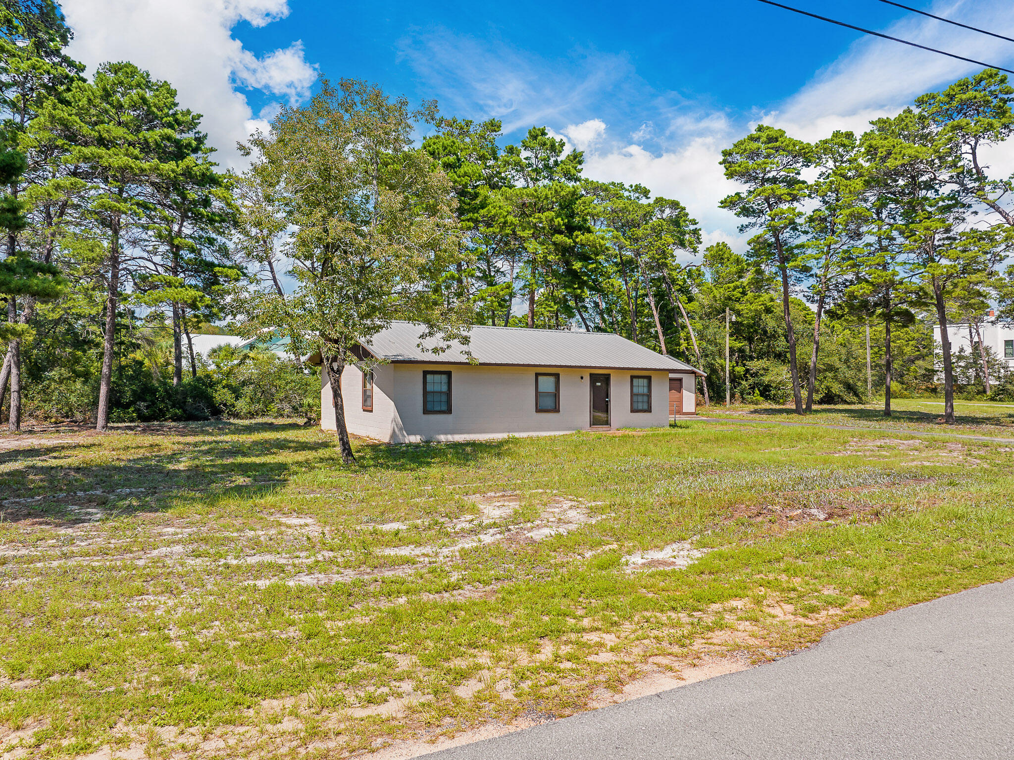 323 Pinewood Lane Inlet Beach, FL 32461 - Photo 14 of 50 a view of a house with a swimming pool