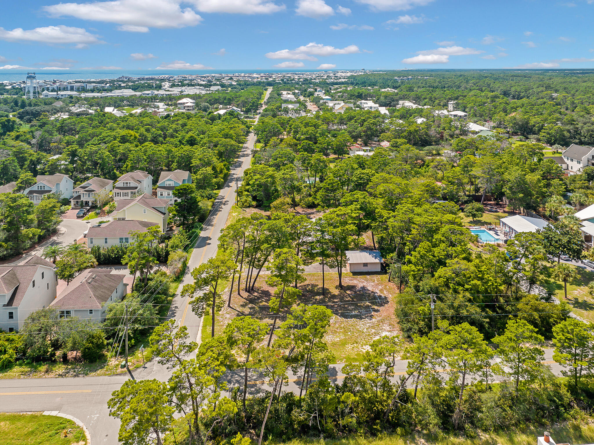 323 Pinewood Lane Inlet Beach, FL 32461 - Photo 24 of 50 an aerial view of residential houses with outdoor space and trees
