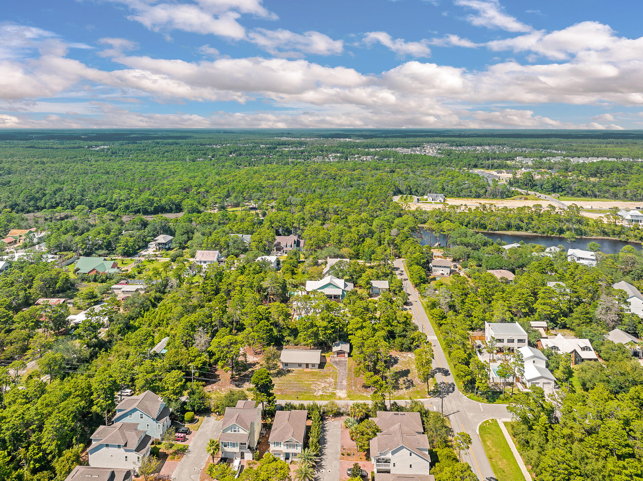 323 Pinewood Lane Inlet Beach, FL 32461 - Photo 40 of 50 an aerial view of residential houses with outdoor space and trees