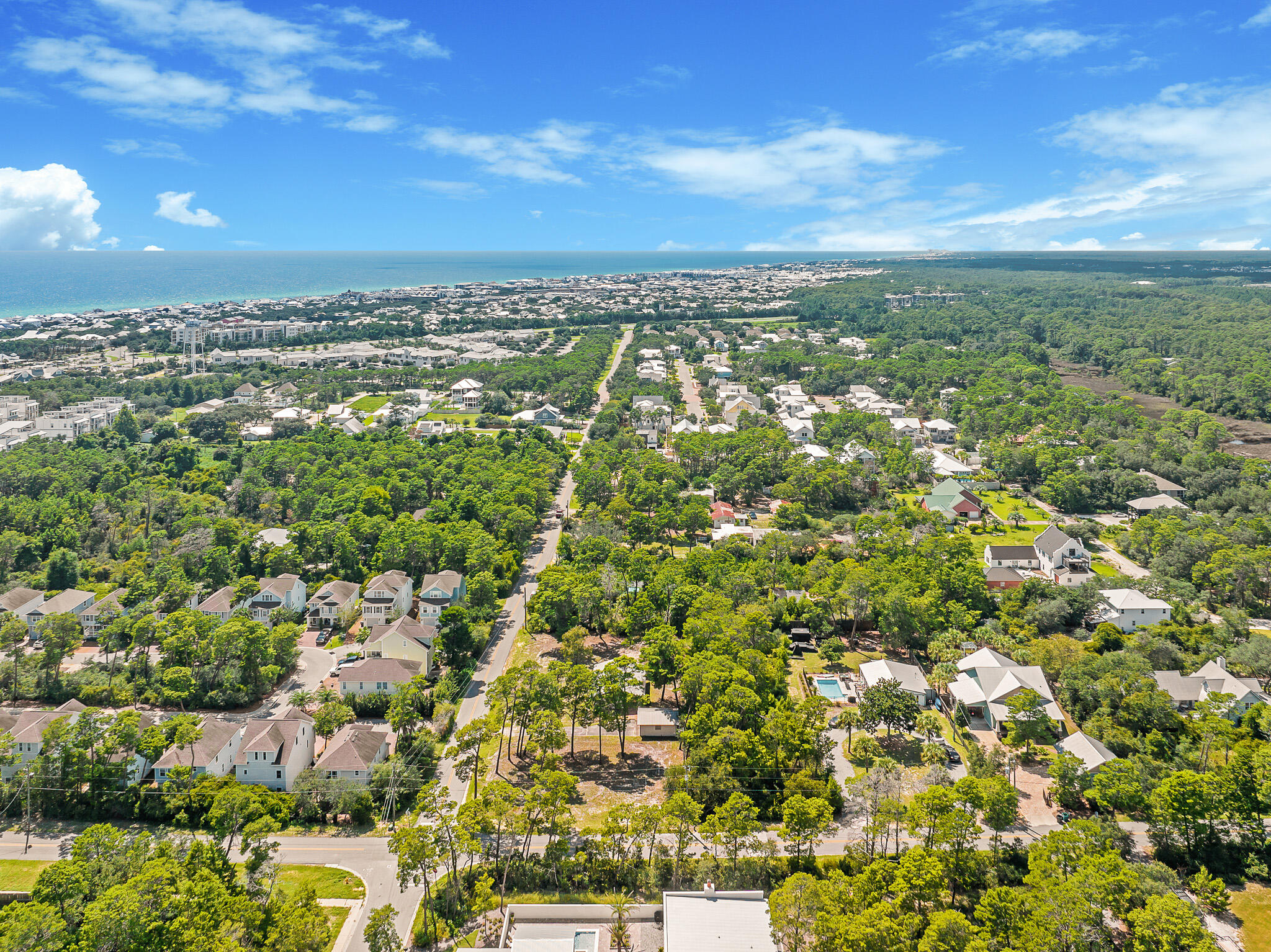 323 Pinewood Lane Inlet Beach, FL 32461 - Photo 43 of 50 an aerial view of residential building with parking space