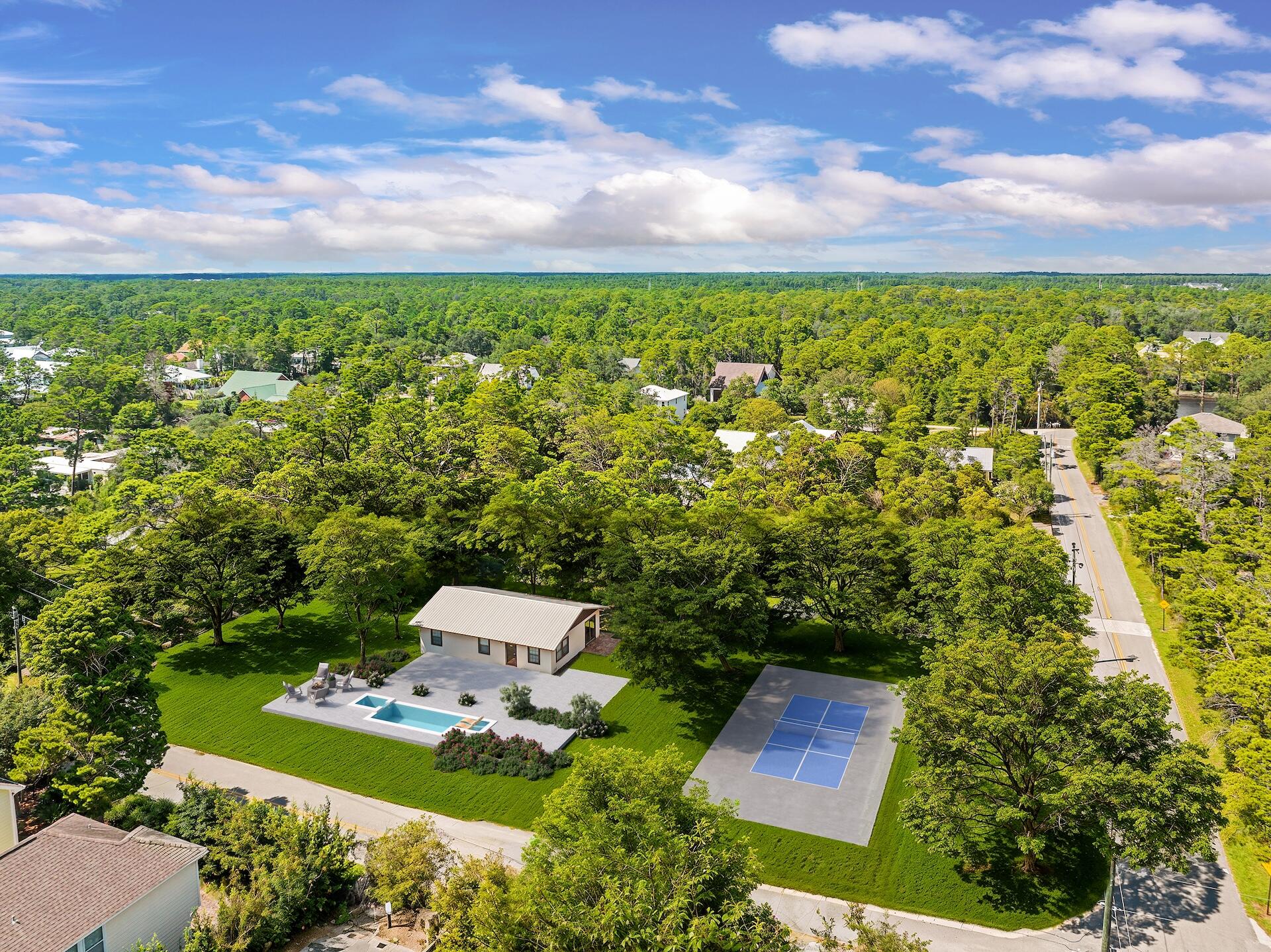 323 Pinewood Lane Inlet Beach, FL 32461 - Photo 49 of 50 a view of a yard with a house