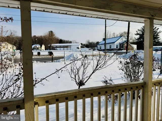 a view of balcony with furniture