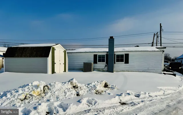 a view of a bedroom with a bed