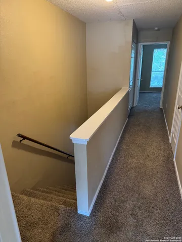 a view of outdoor space with wooden floor