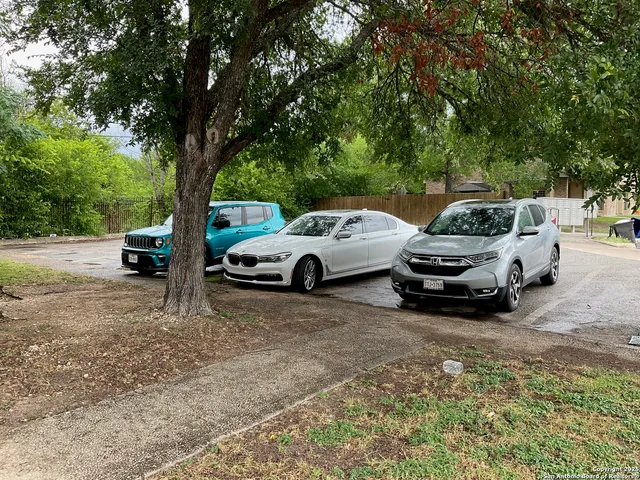 a view of a cars parked in a parking lot