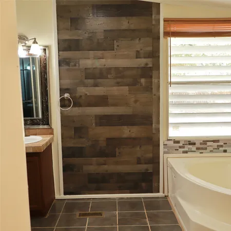 a bathroom with a bathtub