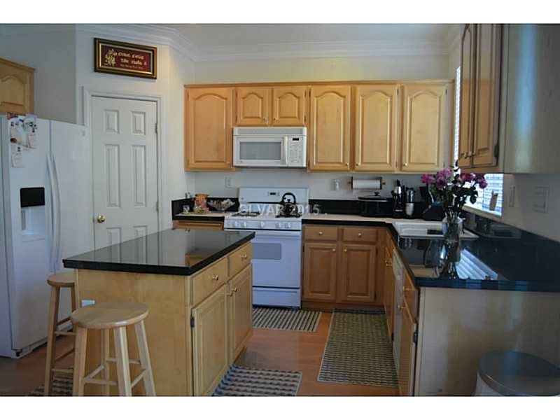 9756 Ridgebluff Avenue Las Vegas, NV 89148 - Photo 10 of 31 Kitchen.