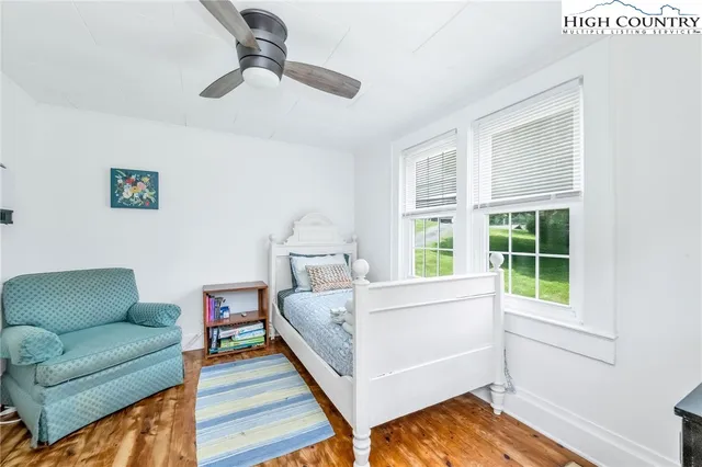 a bed room with a bed and a couch